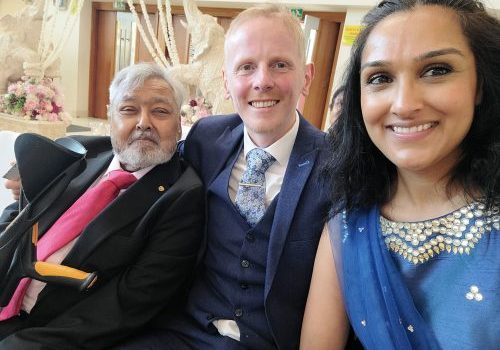 Sam Kang sat with son-in-law Ant next to him, and daughter Mandy wearing a blue sari on the right