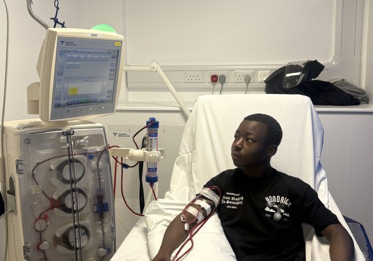 Male teenager, in hospital, having dialysis